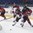 POPRAD, SLOVAKIA - APRIL 13: Latvia's Rihards Paskausks #25 battles Canada's Stylianos Mattheos #12 for the puck  during preliminary round action at the 2017 IIHF Ice Hockey U18 World Championship. (Photo by Andrea Cardin/HHOF-IIHF Images)

